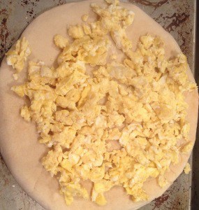 Breakfast pizza is a great way to start the day. You need scrambled eggs for that though! www.busybudgeter.com