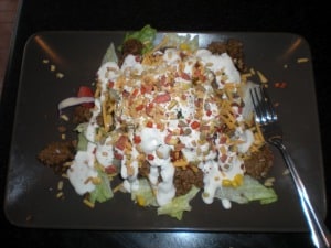 This taco salad is indulgent and easy to make and won't break the bank. So yummy! www.busybudgeter.com