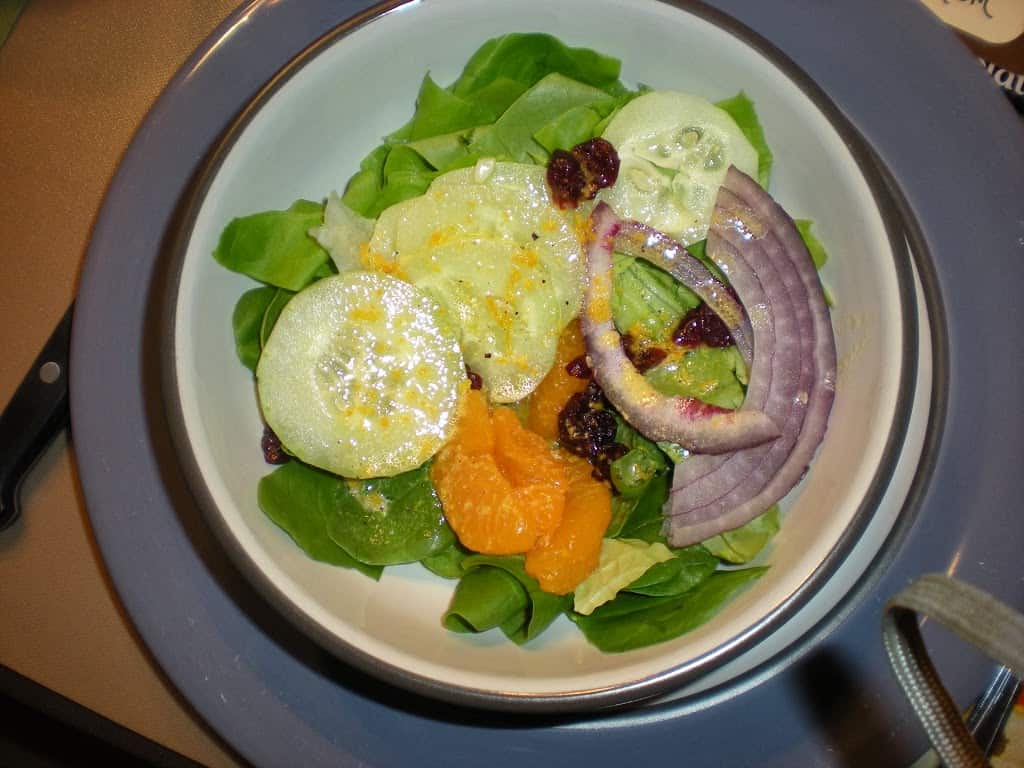 A fun festive salad that packs a sweet punch. This orange salad is wonderful and sweet. www.busybudgeter.com