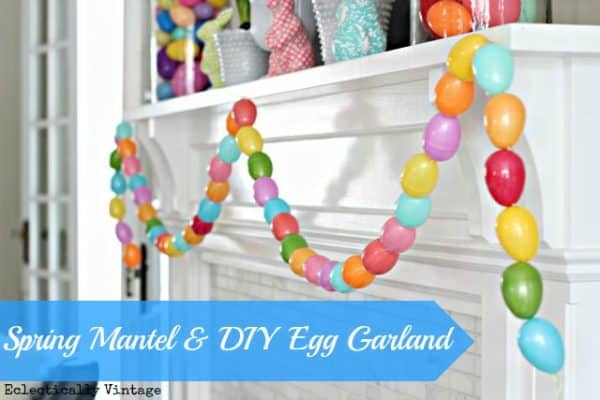 DIY Easter Crafts - this colorful egg garland adds a bit of Spring flare to any home. Hang around a doorframe, fireplace, or around windows and watch the colors POP! It's so pretty, so easy to make, and SO affordable!
