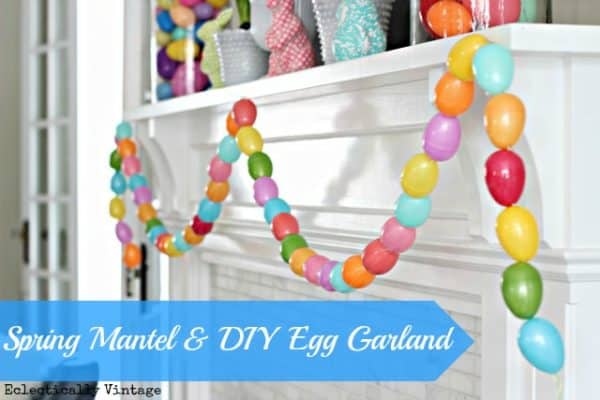 DIY Easter Crafts - this colorful egg garland adds a bit of Spring flare to any home. Hang around a doorframe, fireplace, or around windows and watch the colors POP! It's so pretty, so easy to make, and SO affordable!