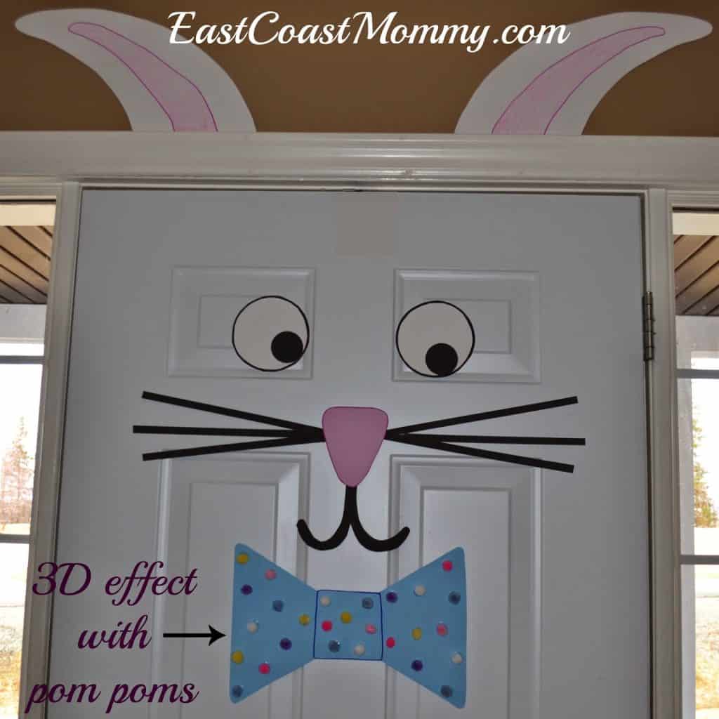 DIY Easter Crafts - decorate your door with this adorable Easter Bunny door decor. So easy to make and it's the perfect craft for kids!