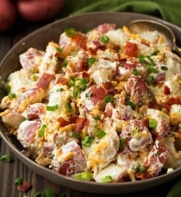 Looking for easy salad recipes, but not into leafy greens? This bacon and cheddar potato salad is perfect! Whip it together for your next backyard BBQ or for a potluck, it will please the whole party.