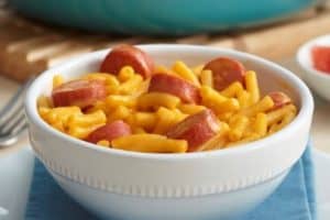 Mac and cheese with hot dogs? YES! This mac hack takes the most basic mac and cheese recipe to the next level and it's so kid-friendly, my kids LOVE it! 
