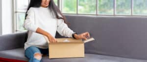 woman preparing the boxes for shipping