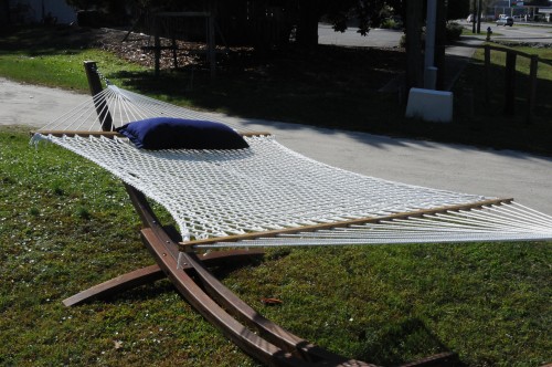 White hammock set up outside.